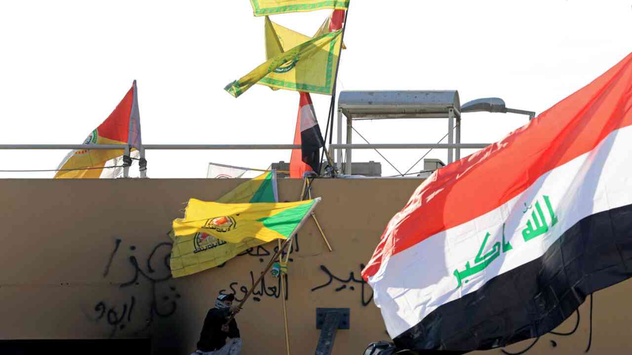 كتائب حزب الله تهدد القواعد الأمريكية في العراق